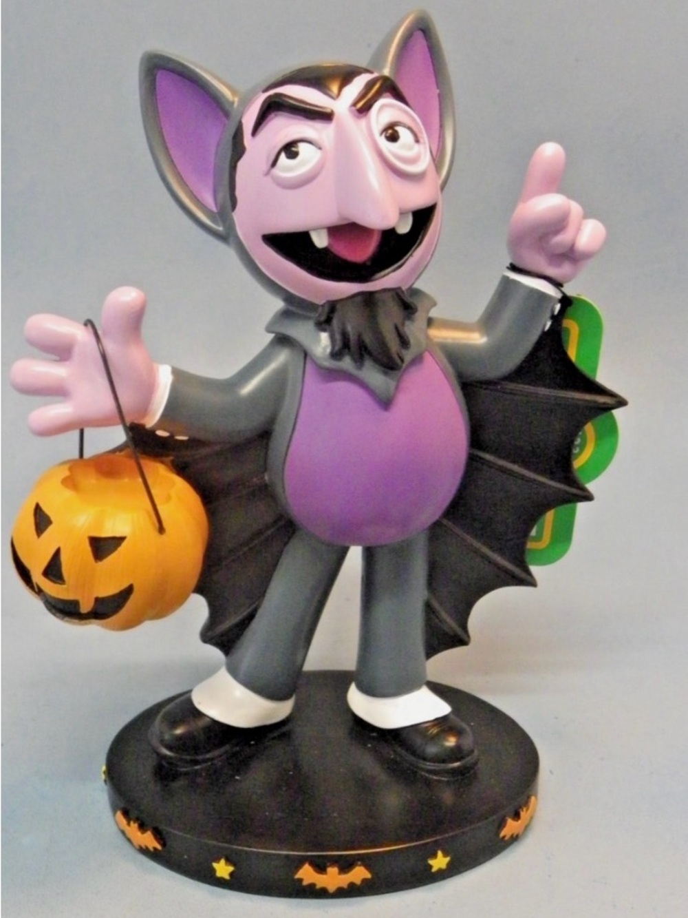 Sesame Street Gray and Purple Count von Count Bat Figurine with Orange Pumpkin